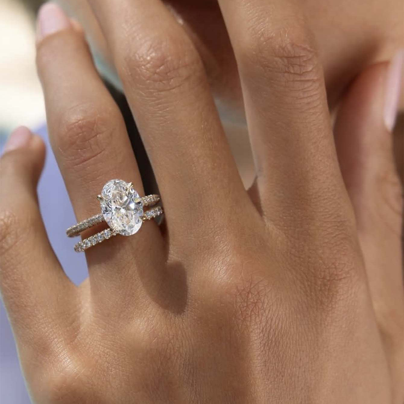 OVAL CUT MOISSANITE CLUSTER ENGAGEMENT RING SET (2.5 Carat)