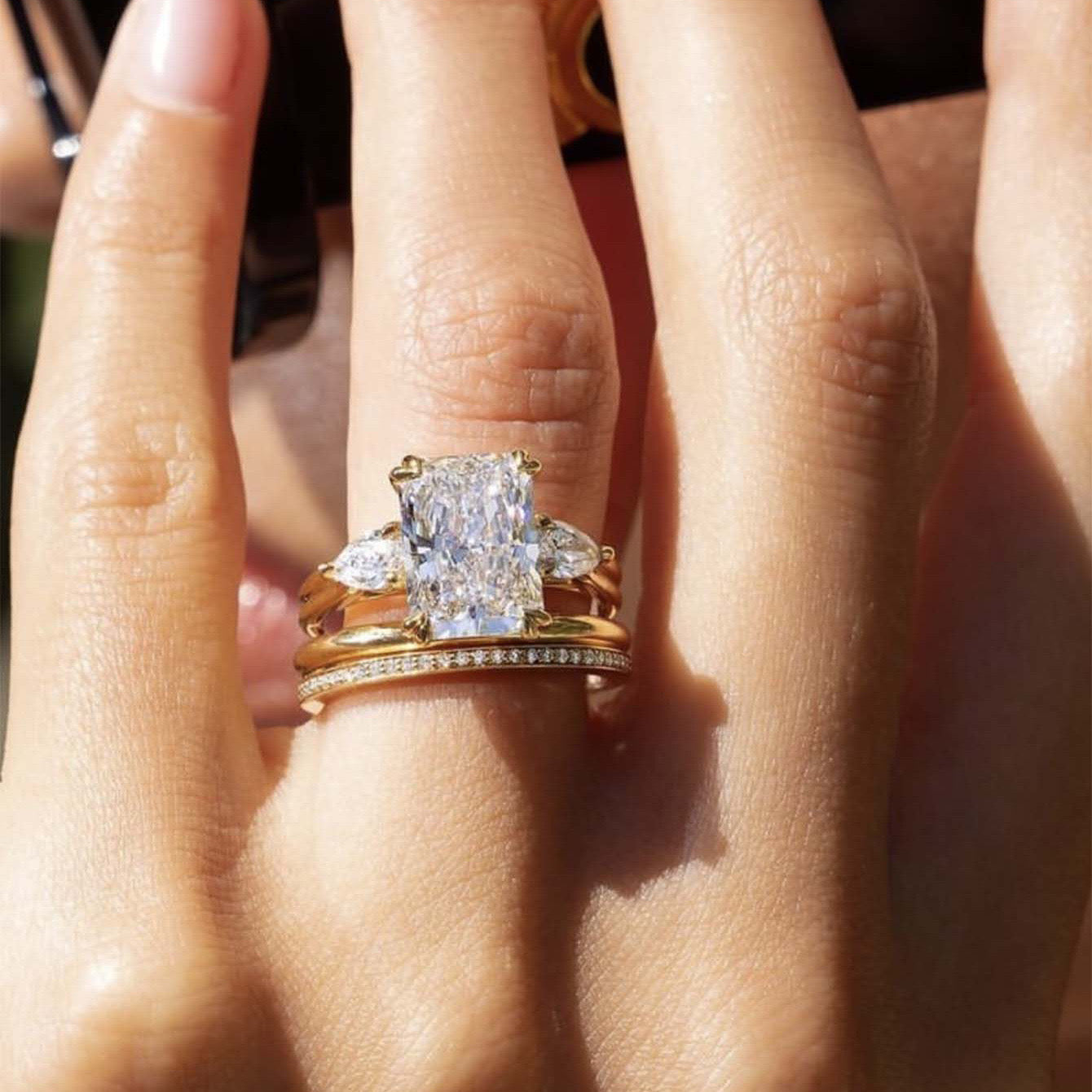 EMERALD CUT MOISSANITE CLUSTER ENGAGEMENT RING SET (3.5 Carat)